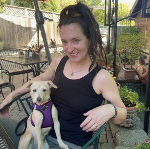 Woman with dog on lap