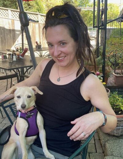 Woman with dog on lap